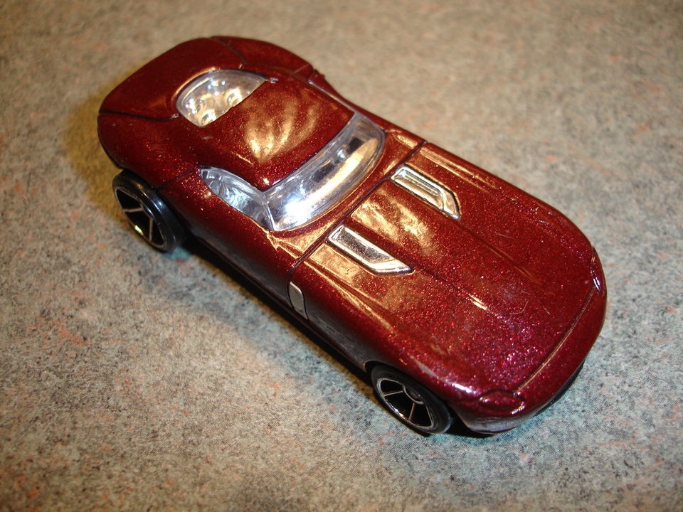 Collectible Metallic Maroon Diecast Hot Wheels Fast Fe Lion Toy Car 