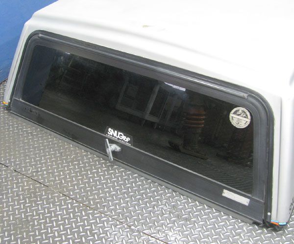 Custom Hardtops Snugtop Truck Bed Cap Cover Off of A Nissan SE Pickup