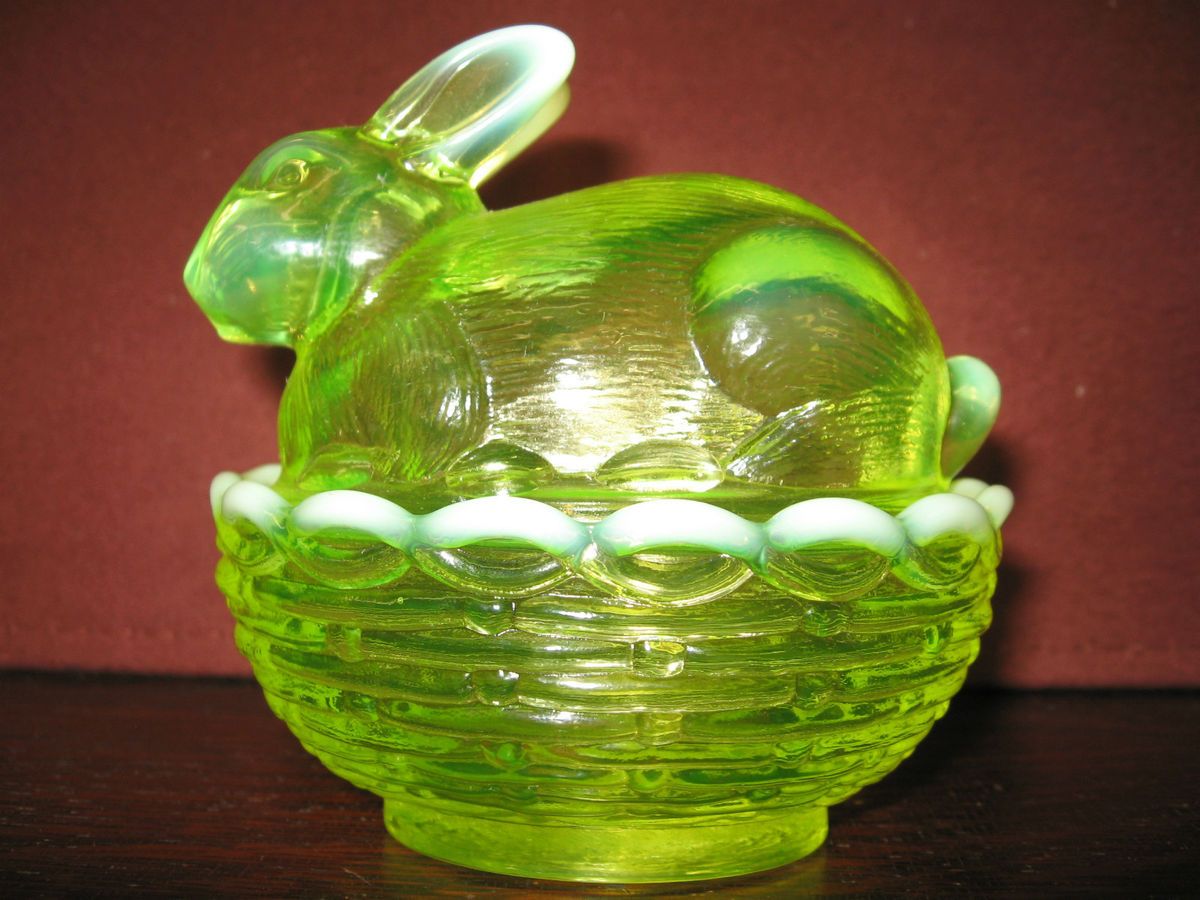 Vaseline opalescent glass bunny rabbit uranium on nest basket dish.