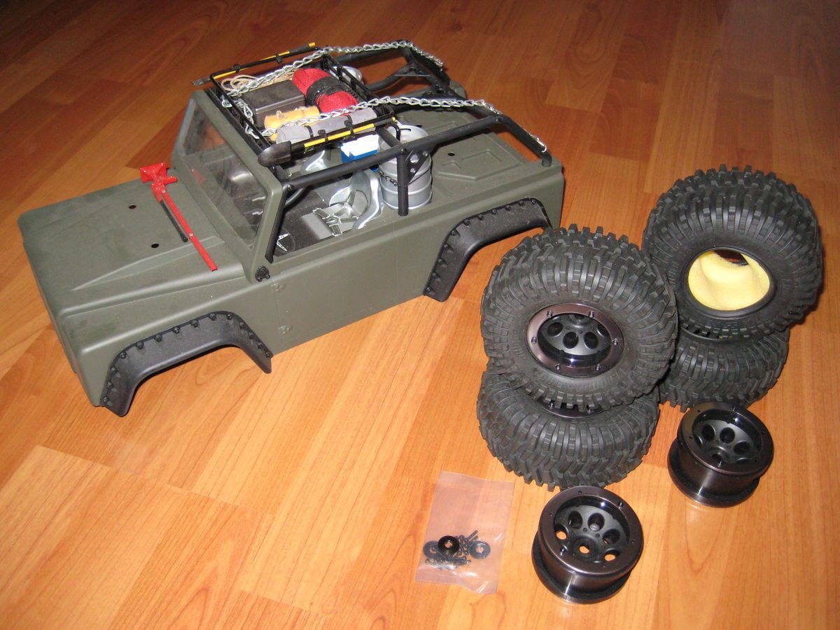 SCX10 TR body with custom paint, 2.2 wheels and rims, and scale extras